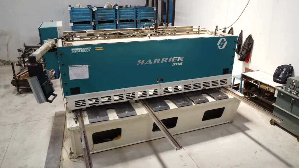 Heavy-duty Harrier cutting machine in scaffolding company workshop used for manufacturing scaffolding clamps and parts