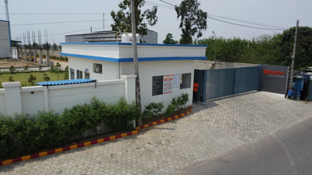 Scaffolding company office exterior with secured gate, construction facility for ring lock system and scaffolding jacks